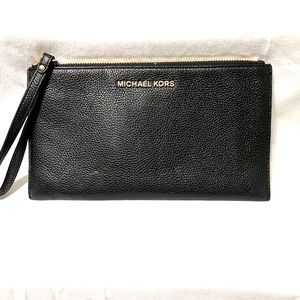 Michael Kors large, black, jet set pebble leather wristlet.
